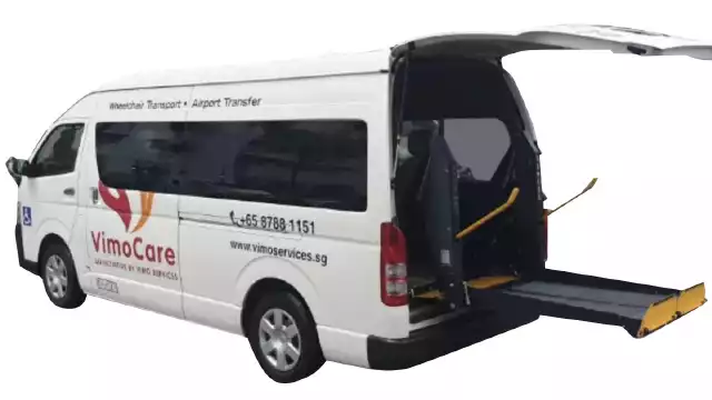 toyota hiace hiroof maxicab wheelchair transport wheelchair taxi with hydraulic lift deployed